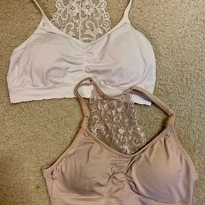 Two Laura Ashley lace racer back bralettes.